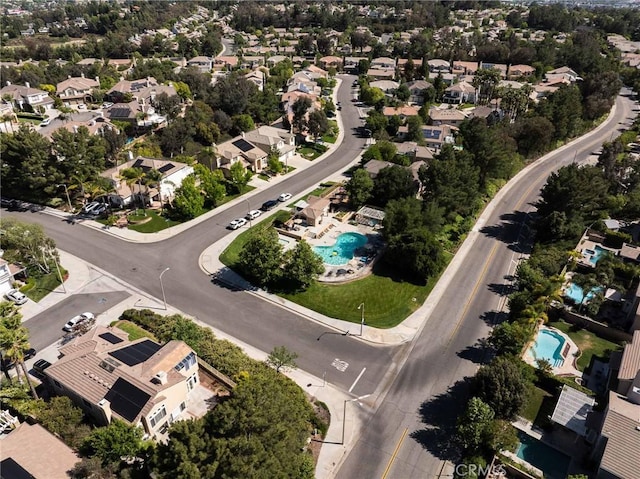23317 Cuestport Dr, Valencia, CA 91354 - aerial view of property's location with a pool area and nearby suburban area