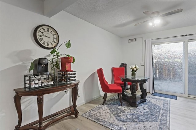 3175 Saginaw Ct, Pleasanton, CA 94588 - living area with ceiling fan, wood finished floors, and a textured ceiling