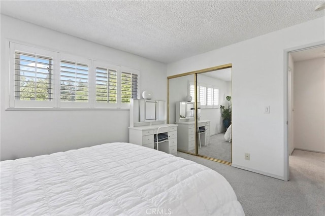 3175 Saginaw Ct, Pleasanton, CA 94588 - bedroom featuring carpet floors, a closet, a textured ceiling, and baseboards