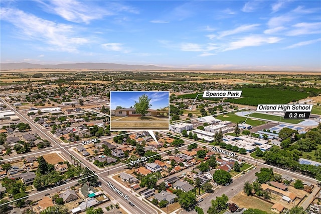 412 2nd St, Orland, CA 95963 - aerial perspective of suburban area featuring a mountain backdrop