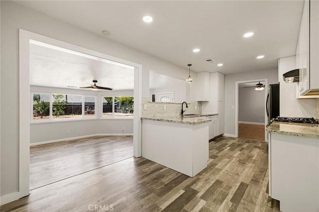 412 2nd St, Orland, CA 95963 - kitchen featuring ceiling fan, a sink, refrigerator, white cabinetry, and recessed lighting