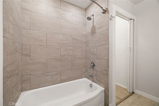 412 2nd St, Orland, CA 95963 - bathroom featuring shower / bath combination and baseboards