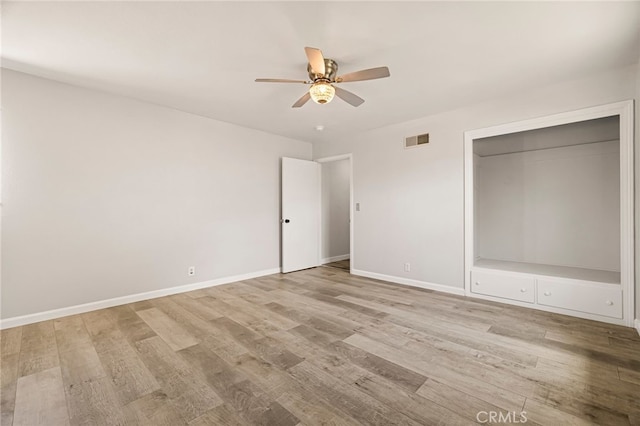 412 2nd St, Orland, CA 95963 - unfurnished bedroom featuring light wood finished floors, baseboards, ceiling fan, and a closet