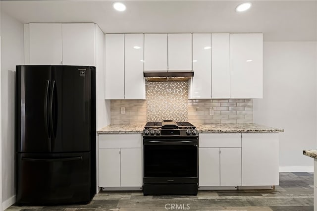 412 2nd St, Orland, CA 95963 - kitchen with freestanding refrigerator, range with gas stovetop, white cabinetry, decorative backsplash, and baseboards