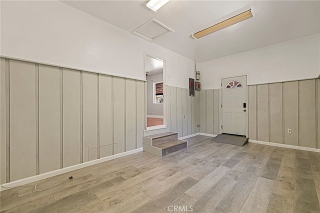 412 2nd St, Orland, CA 95963 - empty room featuring wood finished floors, attic access, and wainscoting