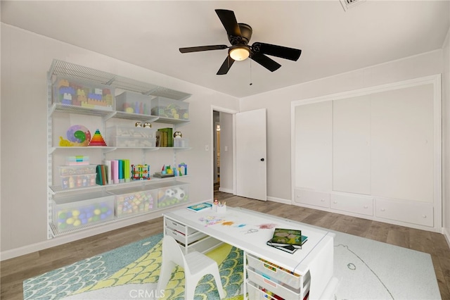 412 2nd St, Orland, CA 95963 - rec room featuring wood finished floors, ceiling fan, and baseboards