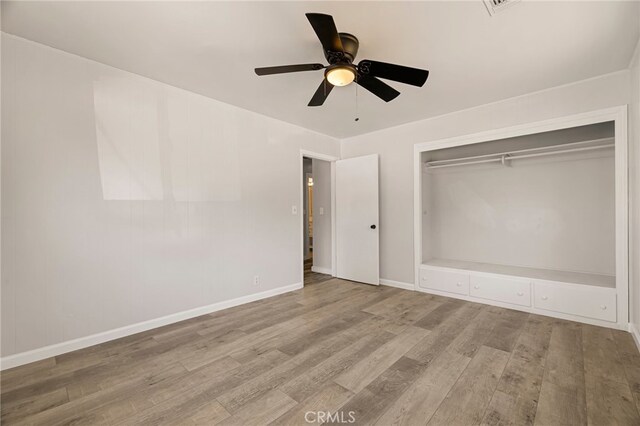 412 2nd St, Orland, CA 95963 - unfurnished bedroom featuring wood finished floors, baseboards, ceiling fan, and a closet