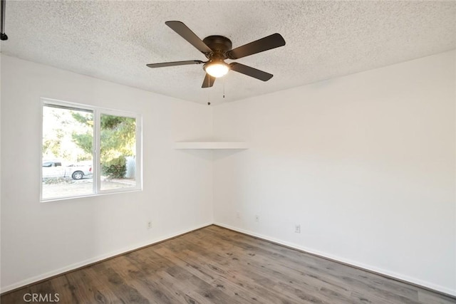 29247 Allan St, Lake Elsinore, CA 92532 - empty room featuring wood finished floors, a textured ceiling, and ceiling fan