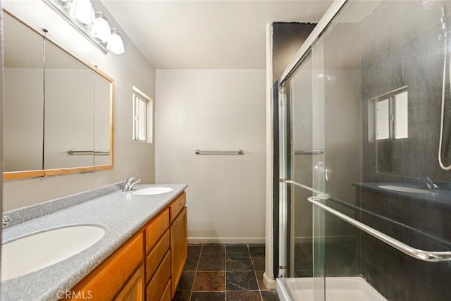 29247 Allan St, Lake Elsinore, CA 92532 - full bath with double vanity, a stall shower, and stone finish flooring