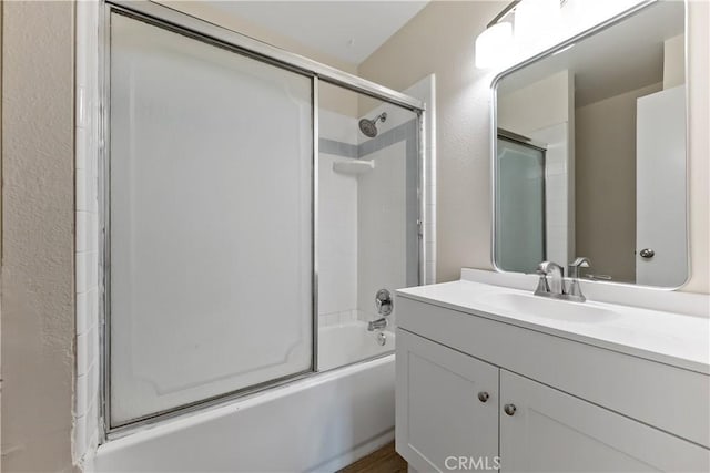 2131 W Pico Ave, Fresno, CA 93705 - bathroom featuring vanity and bath / shower combo with glass door