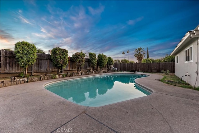 2131 W Pico Ave, Fresno, CA 93705 - view of swimming pool with a patio area, a fenced backyard, and a diving board