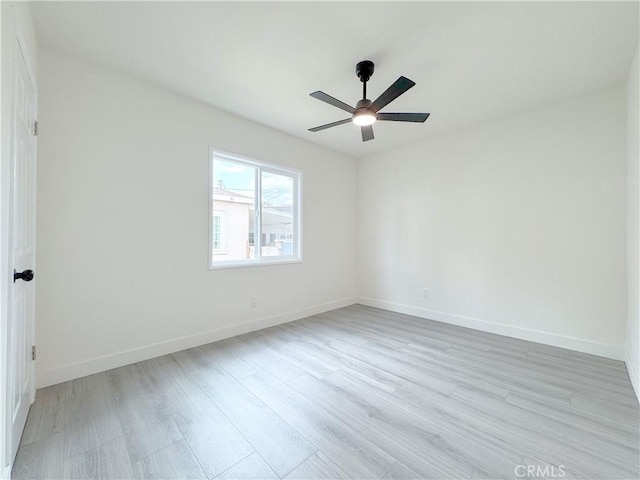 1512 S Butler Ave, Compton, CA 90221 - spare room featuring light wood finished floors, ceiling fan, and baseboards