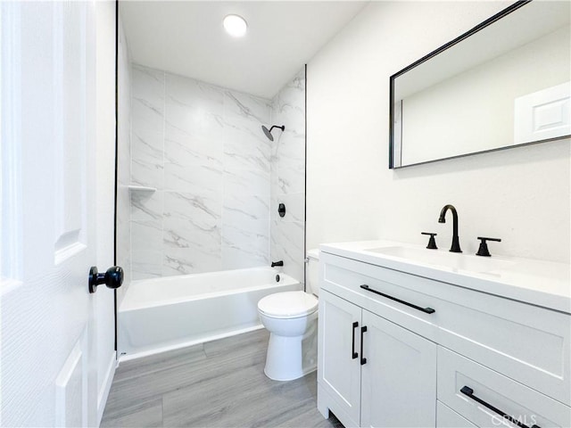 1512 S Butler Ave, Compton, CA 90221 - full bathroom featuring vanity, toilet, shower / tub combination, and wood finished floors