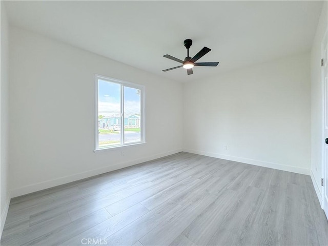 1512 S Butler Ave, Compton, CA 90221 - unfurnished room featuring light wood finished floors, ceiling fan, and baseboards