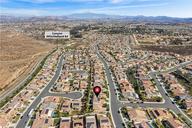 36434 Geranium Dr, Lake Elsinore, CA 92532 - aerial overview of property's location with mountains and nearby suburban area