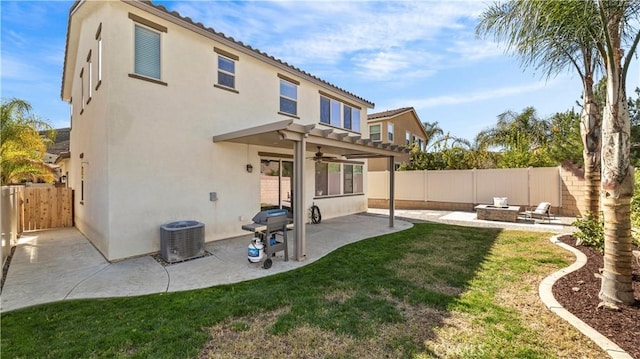 36434 Geranium Dr, Lake Elsinore, CA 92532 - back of house featuring a patio area, a ceiling fan, stucco siding, and central air condition unit