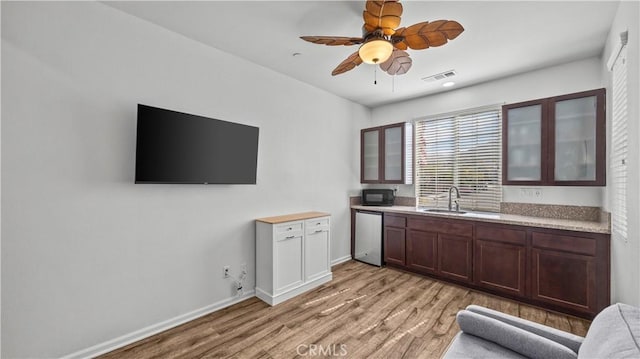 36434 Geranium Dr, Lake Elsinore, CA 92532 - kitchen featuring black microwave, light countertops, a sink, and ceiling fan