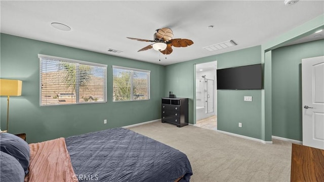 36434 Geranium Dr, Lake Elsinore, CA 92532 - carpeted bedroom featuring ensuite bath, baseboards, and a ceiling fan