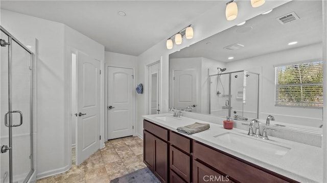 36434 Geranium Dr, Lake Elsinore, CA 92532 - bathroom featuring a stall shower and double vanity