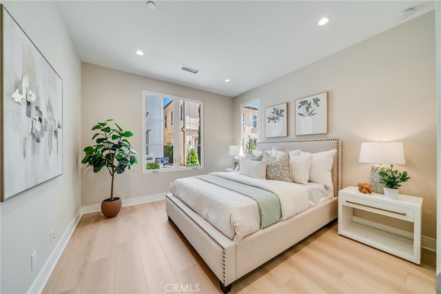 127 Toretta, Irvine, CA 92602 - bedroom with light wood-type flooring, recessed lighting, and baseboards