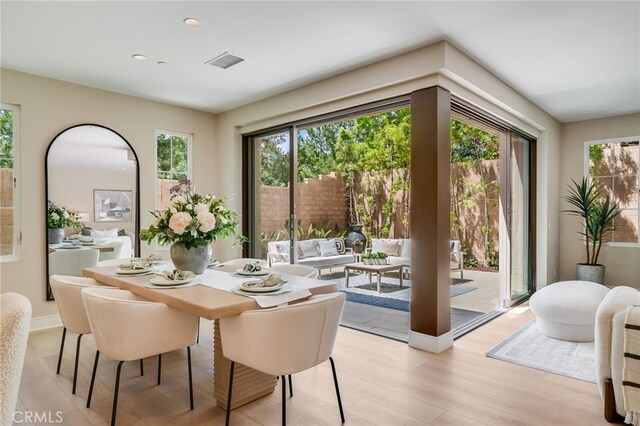 127 Toretta, Irvine, CA 92602 - dining area featuring healthy amount of natural light, light wood-type flooring, and recessed lighting