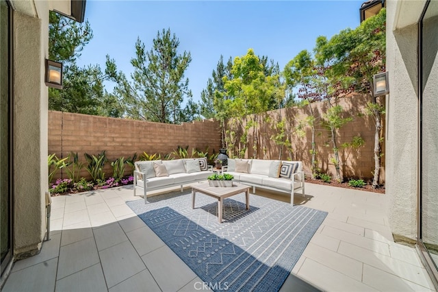127 Toretta, Irvine, CA 92602 - fenced backyard featuring outdoor lounge area and a patio area