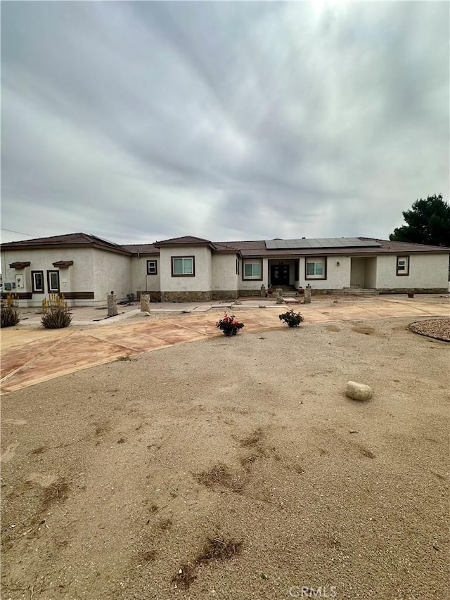 42500 20th St W, Lancaster, CA 93534 - view of front of home with solar panels