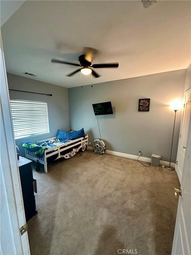 42500 20th St W, Lancaster, CA 93534 - carpeted bedroom with ceiling fan and baseboards