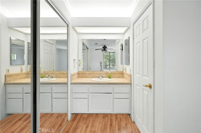 28918 Lillyglen Dr, Canyon Country, CA 91387 - full bath with double vanity, wood finished floors, and a ceiling fan