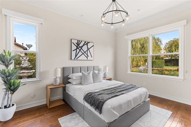 19103 Green Oaks Rd, Yorba Linda, CA 92886 - bedroom with multiple windows, a chandelier, hardwood / wood-style flooring, and ornamental molding