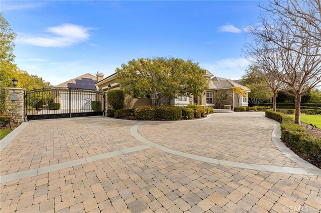 19103 Green Oaks Rd, Yorba Linda, CA 92886 - view of property hidden behind natural elements with a gate