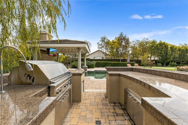 19103 Green Oaks Rd, Yorba Linda, CA 92886 - view of patio / terrace with an outdoor kitchen and a gazebo