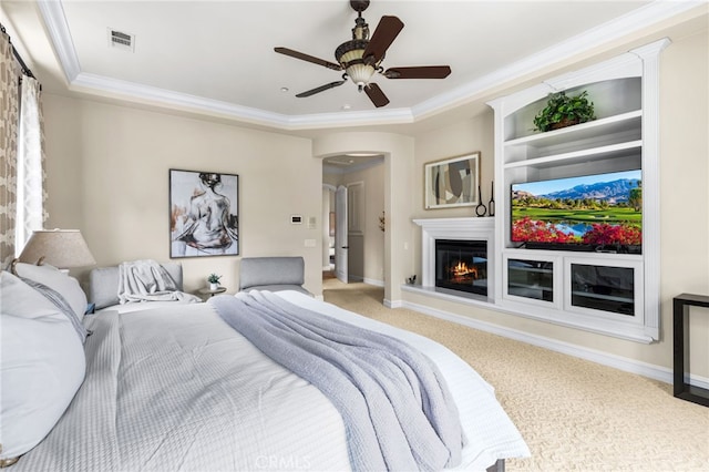 19103 Green Oaks Rd, Yorba Linda, CA 92886 - bedroom featuring carpet, arched walkways, a glass covered fireplace, ornamental molding, and ceiling fan