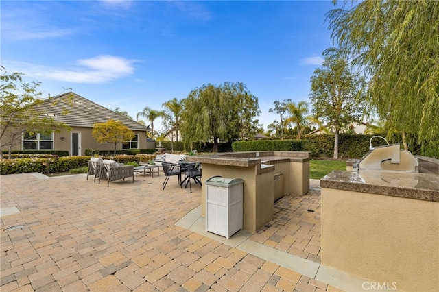 19103 Green Oaks Rd, Yorba Linda, CA 92886 - view of patio / terrace featuring exterior kitchen
