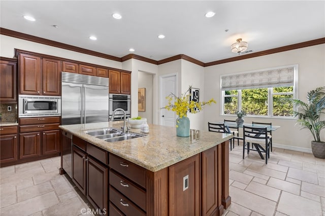 19103 Green Oaks Rd, Yorba Linda, CA 92886 - kitchen with built in appliances, stone tile flooring, light stone countertops, an island with sink, and recessed lighting