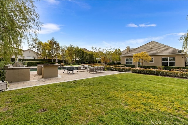 19103 Green Oaks Rd, Yorba Linda, CA 92886 - view of green lawn with a patio and area for grilling