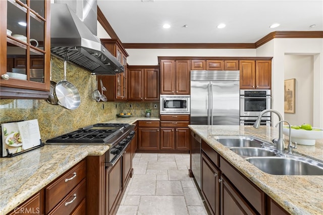 19103 Green Oaks Rd, Yorba Linda, CA 92886 - kitchen with range hood, built in appliances, crown molding, stone tile floors, and recessed lighting