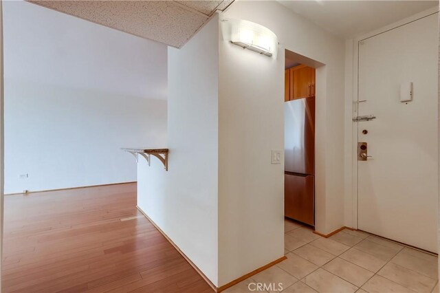 421 S La Fayette Park Pl Unit 701, Los Angeles, CA 90057 - hallway with an AC wall unit and light tile patterned floors