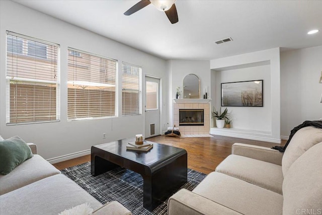 645 Sumner Way Unit 3, Oceanside, CA 92058 - living room featuring wood finished floors, a ceiling fan, a tile fireplace, and recessed lighting
