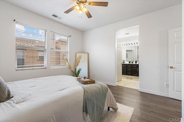 645 Sumner Way Unit 3, Oceanside, CA 92058 - bedroom with wood-type flooring, connected bathroom, and ceiling fan