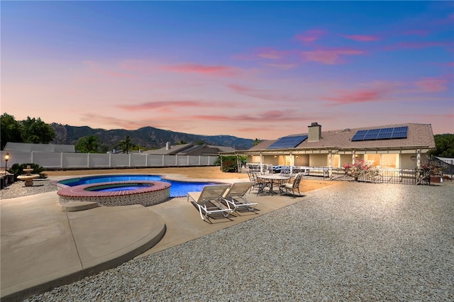 32642 Durango Ct, Wildomar, CA 92595 - view of swimming pool with a fenced backyard, a patio area, a mountain view, outdoor dining space, and a pool with connected hot tub