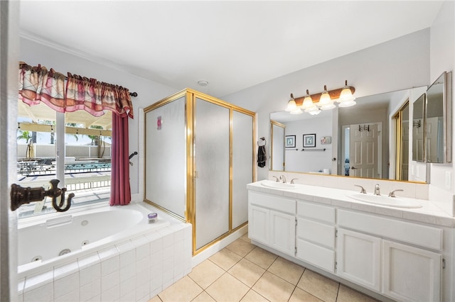 32642 Durango Ct, Wildomar, CA 92595 - bathroom featuring double vanity, a shower stall, a tub with jets, and tile patterned flooring