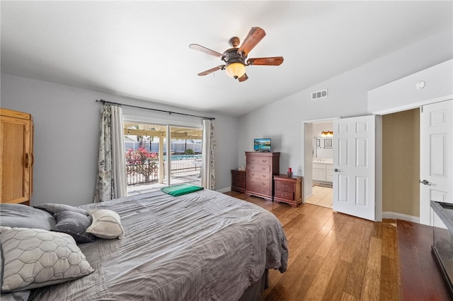 32642 Durango Ct, Wildomar, CA 92595 - bedroom featuring vaulted ceiling, light wood finished floors, access to exterior, baseboards, and ensuite bath