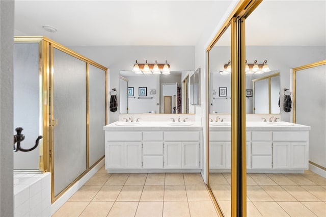 32642 Durango Ct, Wildomar, CA 92595 - bathroom featuring tile patterned flooring, double vanity, and a stall shower