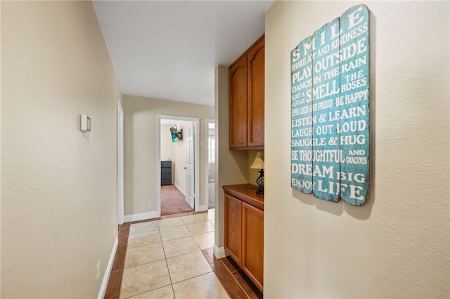32642 Durango Ct, Wildomar, CA 92595 - corridor featuring baseboards and light tile patterned flooring