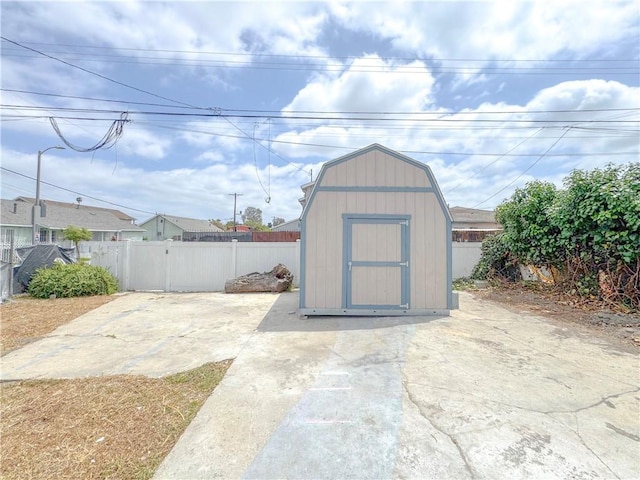 1976 E 112th St, Los Angeles, CA 90059 - view of shed featuring a fenced backyard