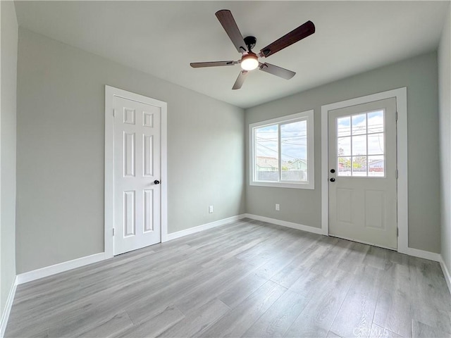 1976 E 112th St, Los Angeles, CA 90059 - empty room featuring light wood-type flooring, baseboards, and ceiling fan