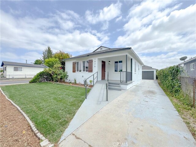 1976 E 112th St, Los Angeles, CA 90059 - view of front of house with covered porch, stucco siding, a detached garage, and an outdoor structure