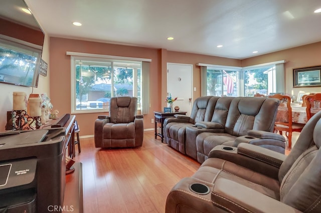 4002 Camerino St, Lakewood, CA 90712 - living area featuring light wood-style floors, recessed lighting, and baseboards