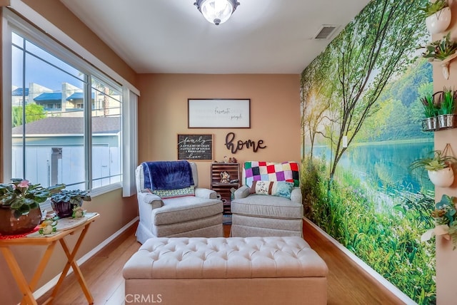 4002 Camerino St, Lakewood, CA 90712 - sitting room with wood finished floors and baseboards